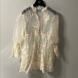 Cream Ruffled Blouse with Puff Sleeves and Mandarin Collar